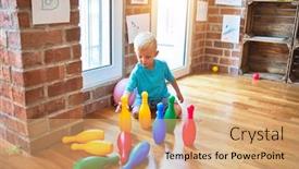  Presentation with bowling - Amazing PPT layouts having young-caucasian-kid-playing-bowling backdrop and a coral colored foreground