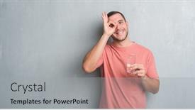  Presentation with eye glass - Audience pleasing PPT theme consisting of young caucasian man over grey grunge wall drinking a glass of water with happy face smiling doing ok sign with hand on eye looking through fingers backdrop and a light gray colored foreground
