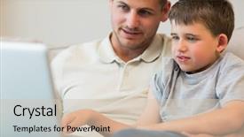  Presentation with foreign boy student - PPT theme with young children computer - father assisting boy in using background and a soft green colored foreground