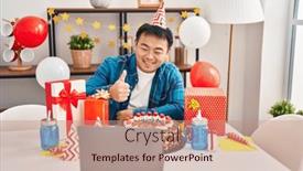 Presentation with happy birthday cake - Presentation design featuring young-chinese-man-celebrating-birthday background and a coral colored foreground