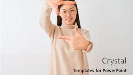  Presentation with creativity - PPT theme featuring young chinese woman wearing turtleneck sweater and glasses over isolated white background smiling making frame with hands and fingers with happy face creativity and photography concept background and a lemonade colored foreground