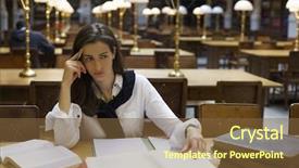 Presentation with contemplating - PPT theme with young confident woman sitting at desk in old university library with books and note pad contemplating background and a tawny brown colored foreground