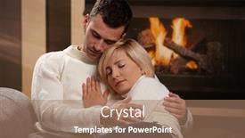  Presentation with couple - PPT theme with young couple hugging on sofa in front of fireplace at home eyes closed background and a coral colored foreground