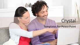  Presentation with computer - Presentation with young couple in front of computer at home background and a soft green colored foreground