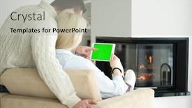  Presentation with internet surfing - PPT theme with young couple in front of fireplace surfing internet using digital tablet on cold winter day at home background and a light gray colored foreground