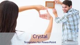  Presentation with young happy couple - Beautiful presentation featuring compass and a mountain map lying on a lichen-covered natural boulder backdrop and a coral colored foreground.