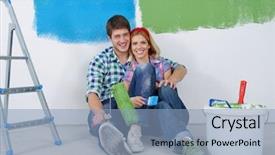  Presentation with young happy couple - Amazing theme having young couple relax after painting backdrop and a light blue colored foreground