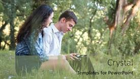  Presentation with radio - Beautiful theme featuring young couple sitting on the grass in the forest and looking on sunset listen to radio summer nature bright sunlight shadows and green leaves romantic feelings backdrop and a seafoam green colored foreground