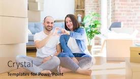  Presentation with romantic love - Presentation theme with young couple sitting on the floor arround cardboard boxes moving to a new house smiling in love showing heart symbol and shape with hands romantic concept background and a coral colored foreground