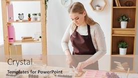 Presentation with mass - Slides consisting of young creative blonde woman in brown apron chopping soap mass on wooden board while working in studio background and a soft green colored foreground