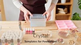  Presentation with mass - Presentation design consisting of young creative woman taking bar of hard soap mass out of plastic container and putting it on wooden board background and a lemonade colored foreground