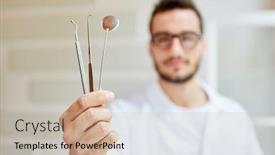  Presentation with dental office - Colorful presentation theme enhanced with young-dentist-with-hand-instruments backdrop and a soft green colored foreground
