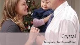  Presentation with wafer - PPT theme enhanced with young family of three sharing traditional christmas eve wafer standing against christmas tree background and a lemonade colored foreground