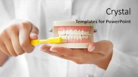  Presentation with dentist - Theme enhanced with young female dentist cleaning dental background and a light gray colored foreground