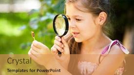  Presentation with flower - Theme consisting of young girl is looking at flower through magnifier outdoor shoot background and a yellow colored foreground
