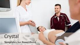  Presentation with gynecologist - Theme featuring young gynecologist showing digital tablet to expectant couple in clinic background and a soft green colored foreground