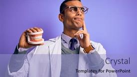  Presentation with denture - PPT theme featuring young-handsome-african-american-dentist background and a light blue colored foreground
