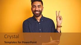 Presentation with victory - Beautiful presentation theme featuring young handsome indian businessman wearing shirt over isolated yellow background smiling with happy face winking at the camera doing victory sign number two backdrop and a gold colored foreground