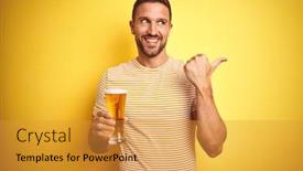  Presentation with drinking glass - Presentation theme featuring young handsome man drinking a pint glass of beer over isolated yellow background pointing and showing with thumb up to the side with happy face smiling background and a gold colored foreground