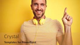  Presentation with yellow music - Presentation design enhanced with young handsome man wearing headphones listening to music over yellow isolated background with a big smile on face pointing with hand and finger to the side looking at the camera background and a yellow colored foreground