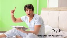  Presentation with reading - PPT layouts enhanced with young handsome student reading book background and a soft green colored foreground