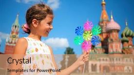  Presentation with pinwheel - Theme enhanced with young happy girl with pinwheel stands on red square looks aside background and a coral colored foreground