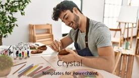  Presentation with art - PPT theme enhanced with young-hispanic-artist-man-smiling background and a coral colored foreground