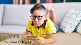  Presentation with video game - Slide set featuring young-hispanic-kid-playing-video background and a gold colored foreground