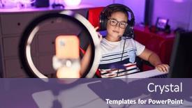  Presentation with video games playing - PPT theme consisting of young-hispanic-kid-playing-video background and a violet colored foreground