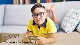  Presentation with controller - Presentation design consisting of young-hispanic-kid-playing-video background and a  colored foreground
