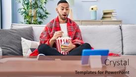  Presentation with movie popcorn - PPT theme featuring young-hispanic-man-eating-popcorn background and a coral colored foreground
