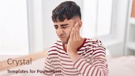  Presentation with ear pain - Presentation with young-hispanic-man-suffering background and a lemonade colored foreground