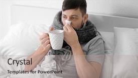  Presentation with hot tea - Theme enhanced with young ill man drinking hot tea at home background and a light gray colored foreground