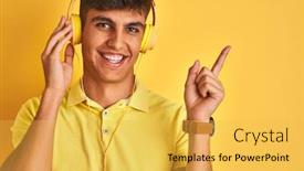  Presentation with yellow music - Cool new slides with young indian man listening to music using headphones over isolated yellow background very happy pointing with hand and finger to the side backdrop and a yellow colored foreground