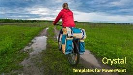  Presentation with rural road - PPT theme consisting of young lady hiker with loaded bicycle riding on a wet rural road in the meadow background and a tawny brown colored foreground