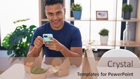  Presentation with smartphone - PPT theme featuring young-latin-man-using-smartphone background and a  colored foreground