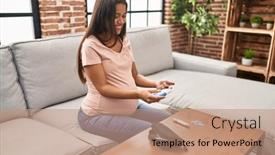  Presentation with pregnant woman - Presentation theme with young-latin-woman-pregnant-measuring background and a coral colored foreground