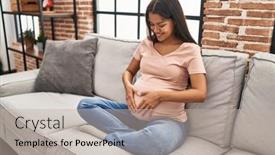  Presentation with pregnant woman - PPT layouts consisting of young-latin-woman-pregnant-touching background and a mint green colored foreground