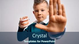  Presentation with dental prosthesis - Audience pleasing PPT theme consisting of young-little-caucasian-kid-holding backdrop and a ocean colored foreground