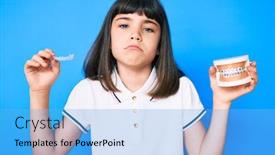  Presentation with orthodontic - Slide deck enhanced with young-little-girl-with-bang background and a light blue colored foreground