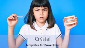  Presentation with orthodontic - Audience pleasing presentation theme consisting of young-little-girl-with-bang backdrop and a light blue colored foreground