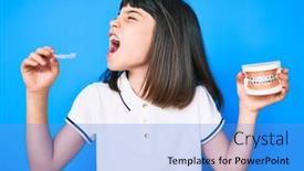  Presentation with orthodontic - Amazing PPT theme having young-little-girl-with-bang backdrop and a teal colored foreground