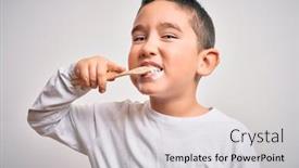  Presentation with tooth paste - Theme having young-little-kid-boy-brushing background and a light gray colored foreground