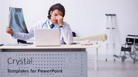  Presentation with radiologist - Cool new PPT theme with young male doctor radiologist working in the clinic backdrop and a light gray colored foreground