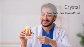  Presentation with clinic - Amazing presentation theme having young-male-odontologist-working backdrop and a light gray colored foreground