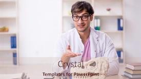  Presentation with lab animals - PPT theme consisting of young-male-paleontologist-examining-ancient background and a soft green colored foreground