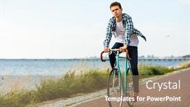  Presentation with biking - Amazing PPT theme having cyclist country road - young man biking at seaside backdrop and a coral colored foreground