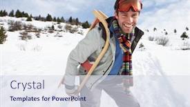  Presentation with alpine - Amazing PPT theme having young man carrying sled in alpine landscape backdrop and a sky blue colored foreground