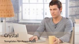  Presentation with young man holdng laptop on lap money - PPT theme featuring young man concentrating on laptop background and a soft green colored foreground