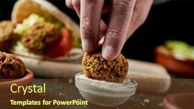  Presentation with green yogurt - PPT theme having young-man-dips-a-falafel background and a tawny brown colored foreground